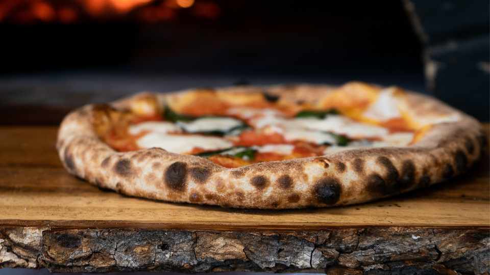 what does pizza mean in italian
